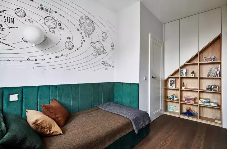 The wall of the first room was decorated with a space theme