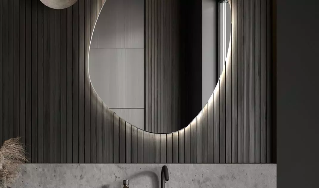 A mirror wider than the sink creates an interesting effect