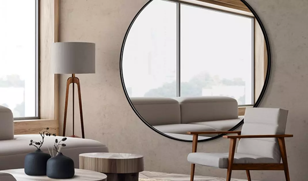 A mirror in the living room will help create a bright and cozy interior