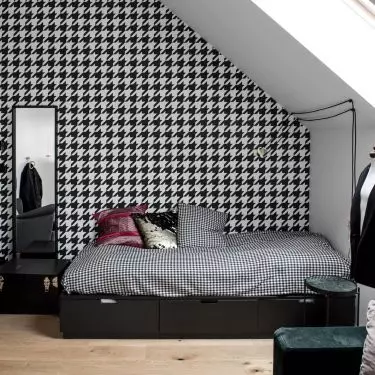 The wall has been decorated with pepito wallpaper