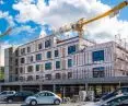 Assembly of a multi-family modular building with wooden structure by a Polish company 