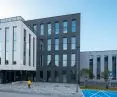 The facade of the sports hall building is made in three colors