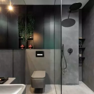 A walk-in shower makes the room appear larger