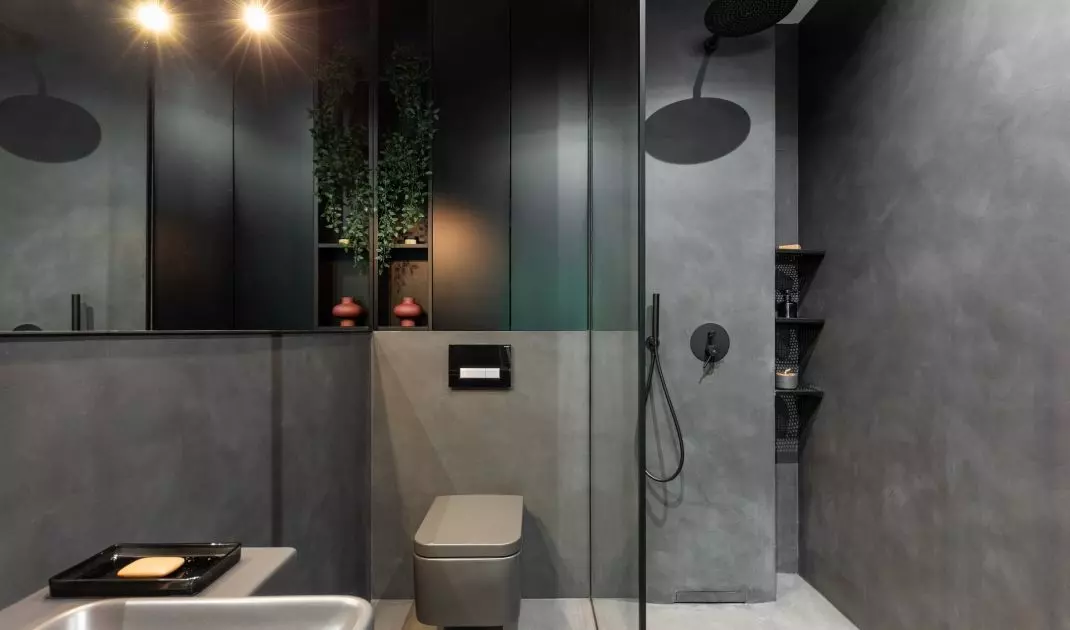 A walk-in shower makes the room appear larger
