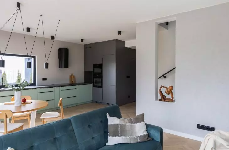 The open-plan living area consists of a kitchen, dining room and living room