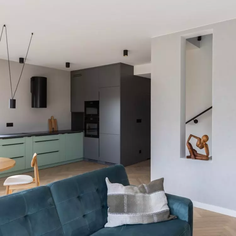 The open-plan living area consists of a kitchen, dining room and living room