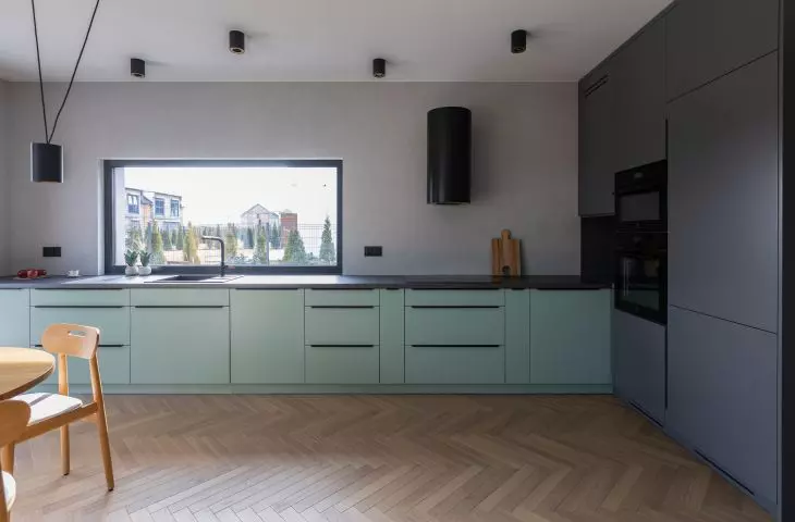 Eucalyptus fronts combine beautifully with the graphite of the development