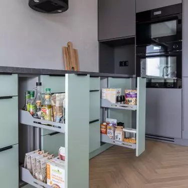 The cabinets have been equipped with systems for easy storage