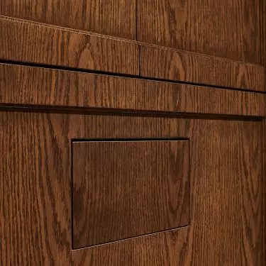 Flat toilet button blends with the wall 