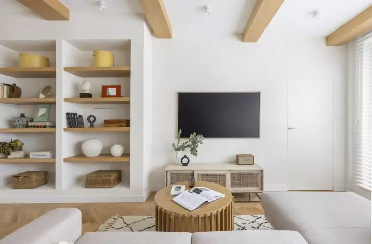 The focal point of the living room is the TV