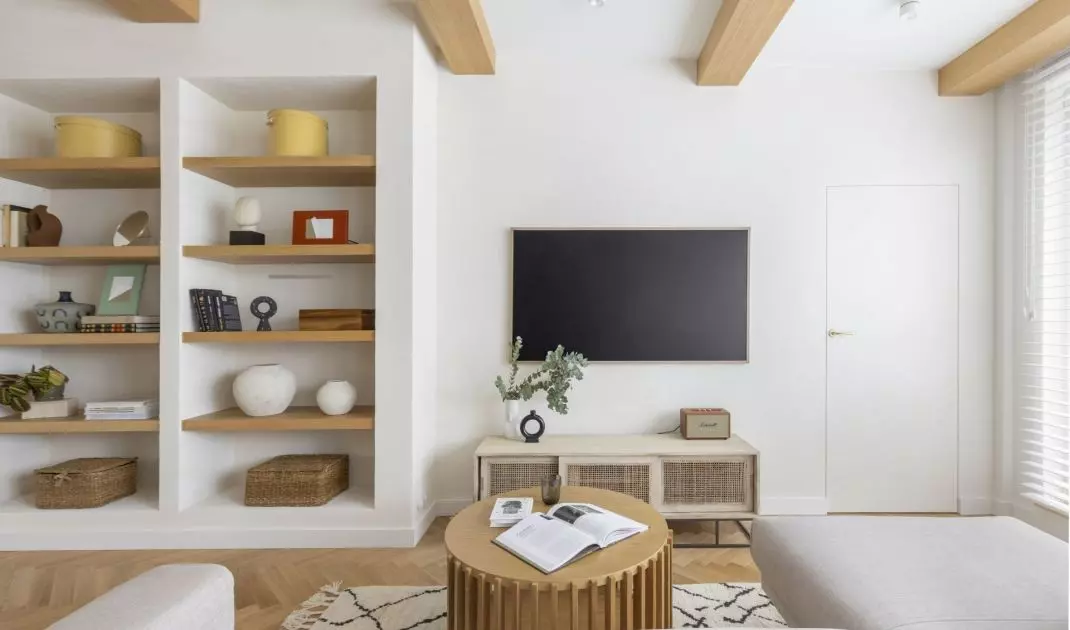 The focal point of the living room is the TV