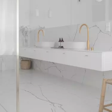 Two washbasins have been placed on a long piece of furniture