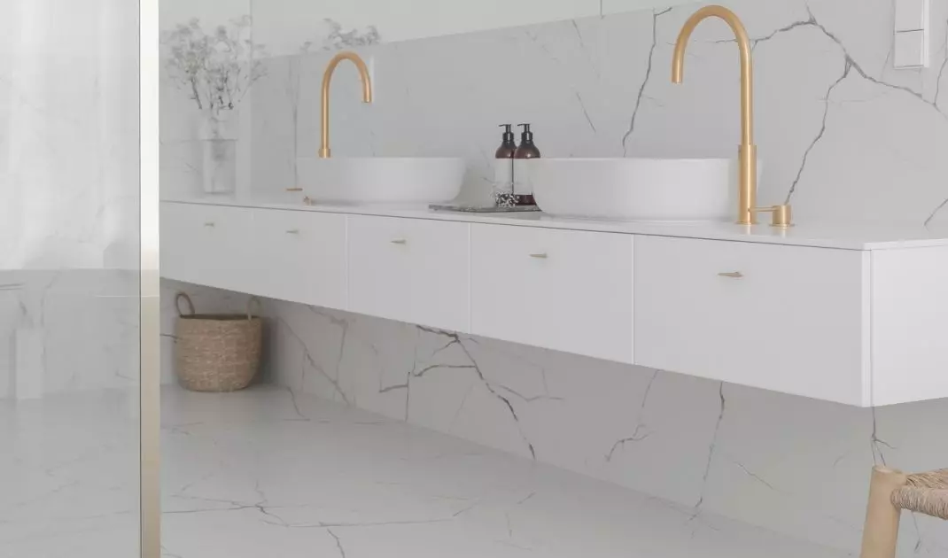 Two washbasins have been placed on a long piece of furniture