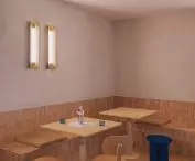 part of the walls is covered with a lampery of narrow, rectangular tiles in a beige shade