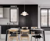 Dining area of the apartment - in the background, oak kitchen cabinets