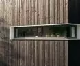 The material on the facade is Siberian larch