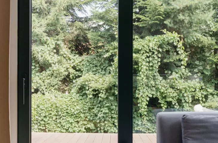 large glazing in the living room and exit to the terrace