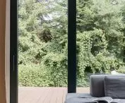 large glazing in the living room and exit to the terrace