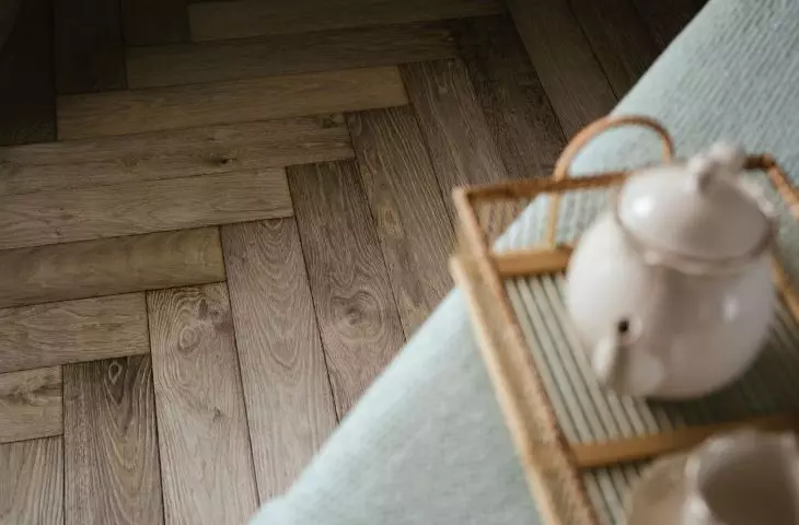 The floor was covered with planks in a classic herringbone pattern.