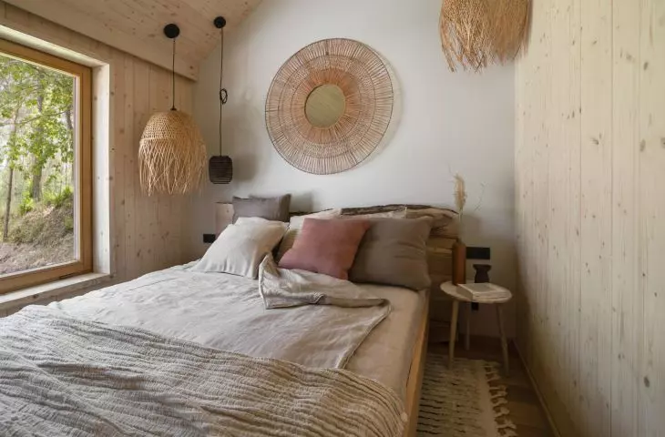 The interior is dominated by wood referring to the surroundings