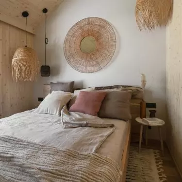 The interior is dominated by wood referring to the surroundings