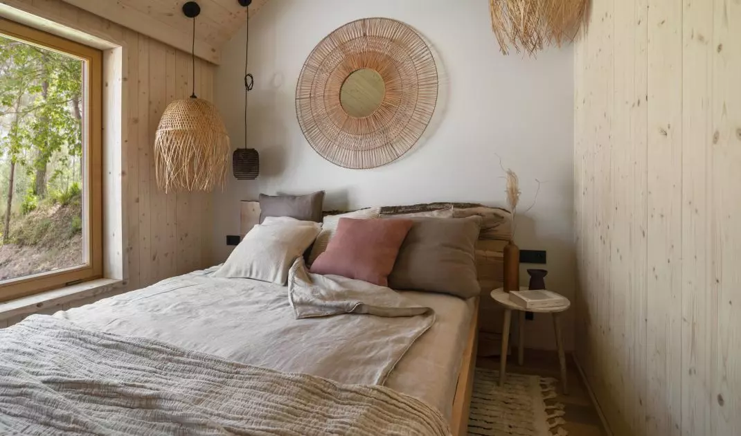 The interior is dominated by wood referring to the surroundings