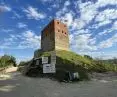 Melsztyn castle ruins disfigured by information boards