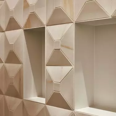 Shelves for cosmetics have been created in the wall