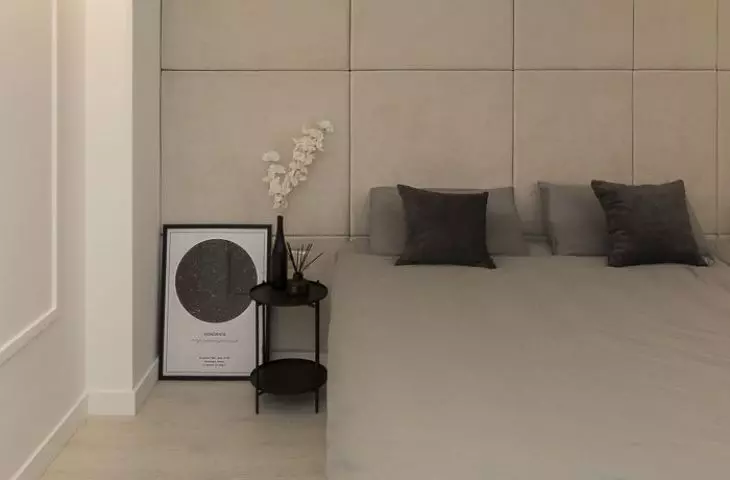 The focal point of the bedroom is the large bed