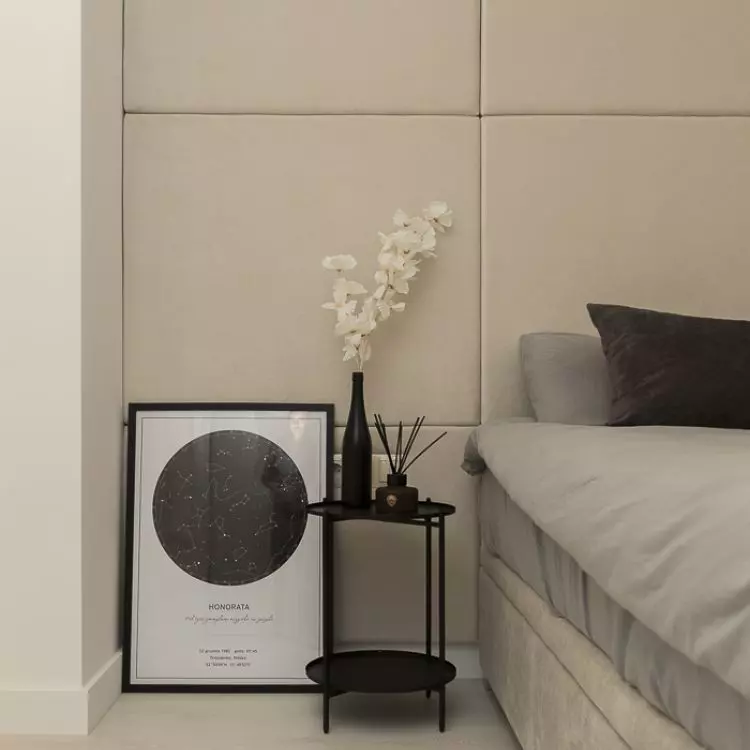 Black bedside tables are a functional addition