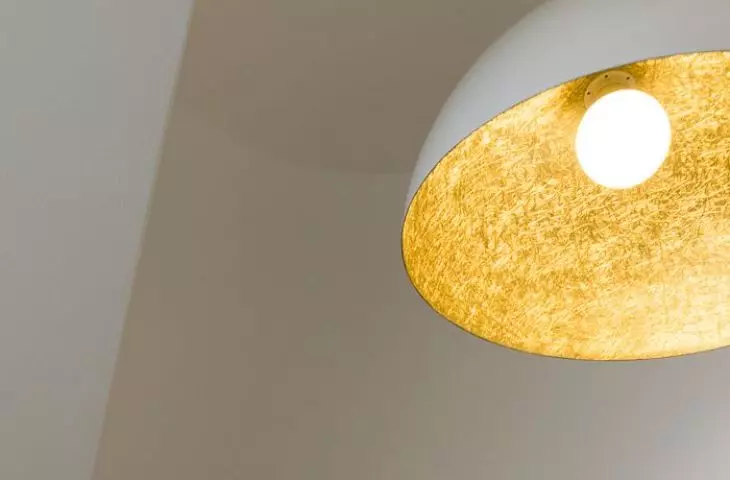The gold interior of the lamps adds a touch of elegance to the arrangement