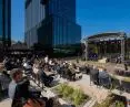 An urban square to become a place of relaxation and entertainment for employees from the office space 