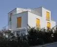 the house was built for the families of two brothers - its form is the result of pragmatic and very precise answers to their needs and possibilities - as a result, it becomes a formal abstraction of their mutual relations