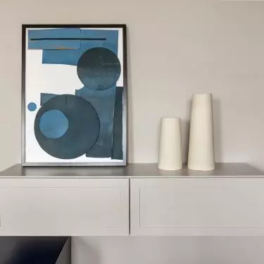 Blue accessories enliven the space
