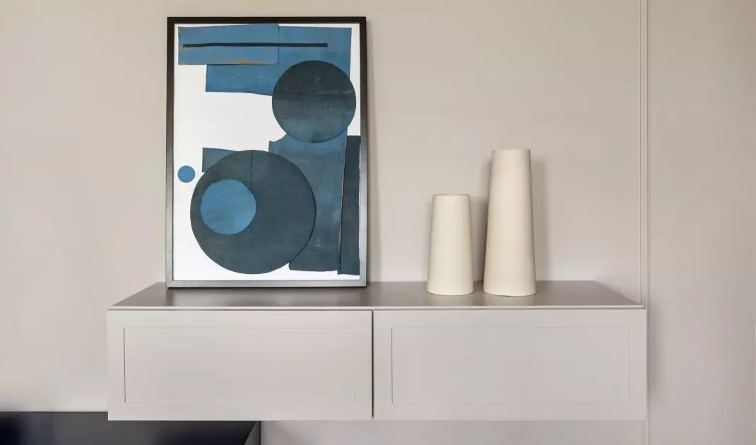 Blue accessories enliven the space