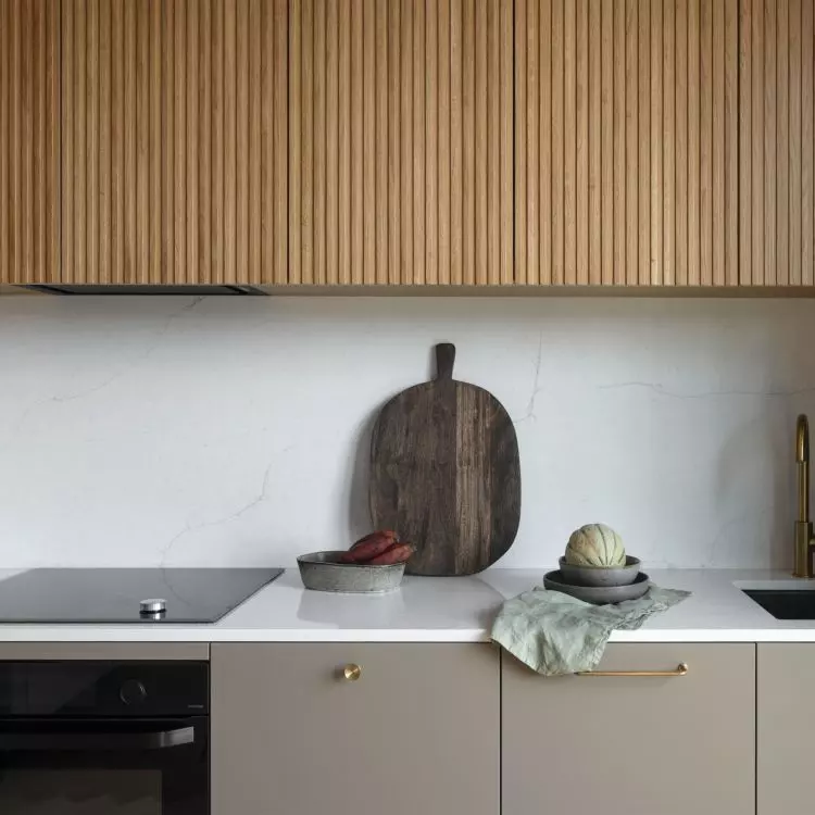 The fronts of the upper cabinets of the development were made of fluted veneer 