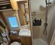 Spacious, comfortable bathroom with toilet and shower - the key to complete satisfaction