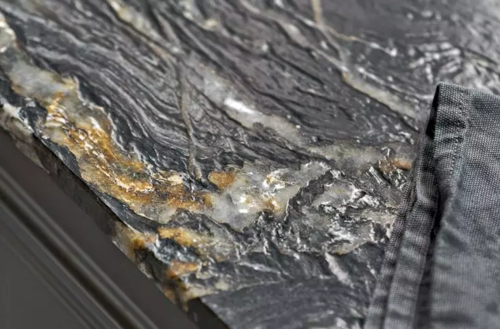 The countertop was covered with natural granite
