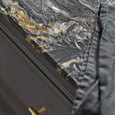 The countertop was covered with natural granite