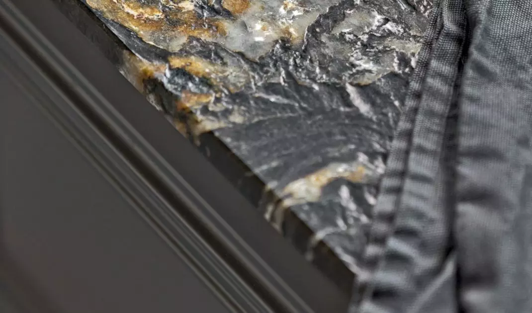The countertop was covered with natural granite