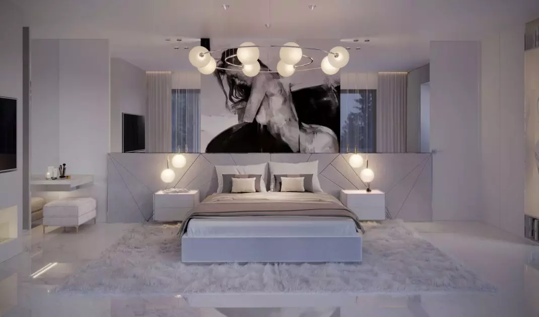 The wall behind the bed was decorated with upholstered panels and graphics