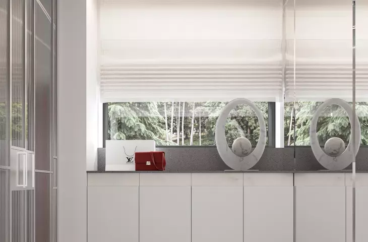 The windowsill is decorated with a marble sculpture
