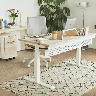 Scandinavian-style home office is functional, comfortable and bright