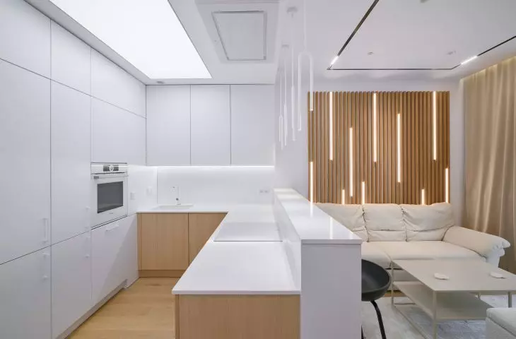 The arrangement is dominated by a combination of white and light wood