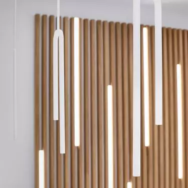 The laths are interspersed with LED lighting
