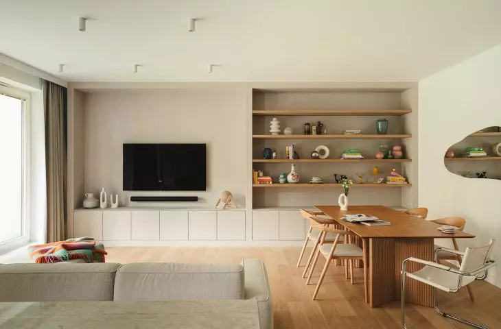 A wall with wooden shelves is a place to display gems from the antique market