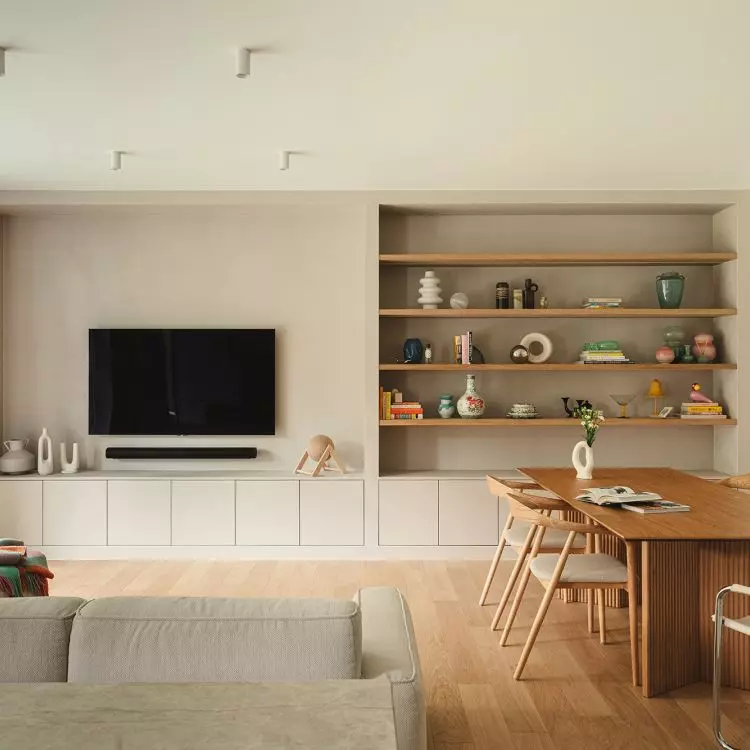 A wall with wooden shelves is a place to display gems from the antique market