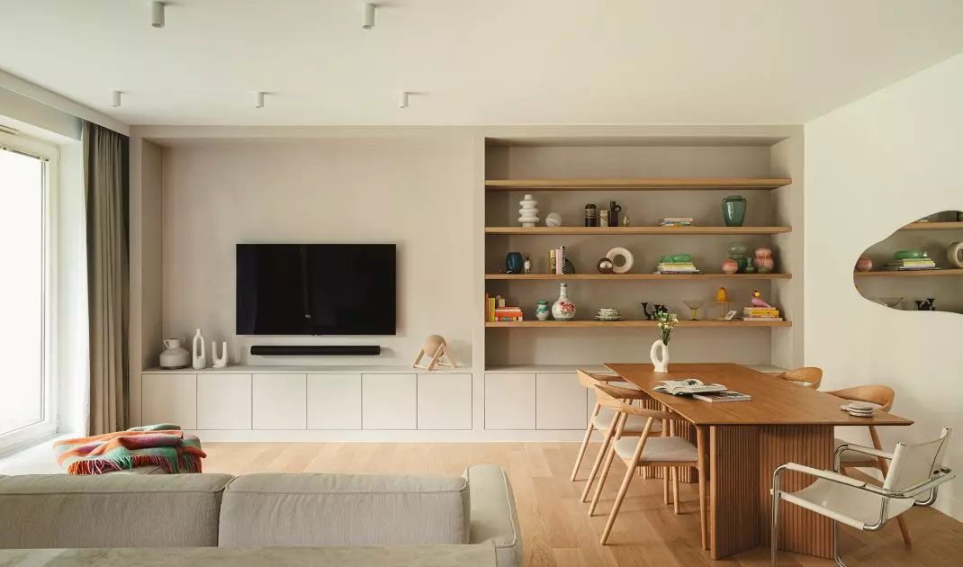 A wall with wooden shelves is a place to display gems from the antique market