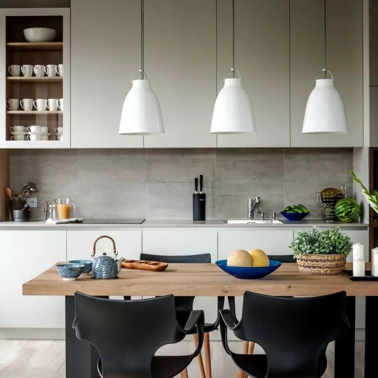 The kitchen is dominated by grays