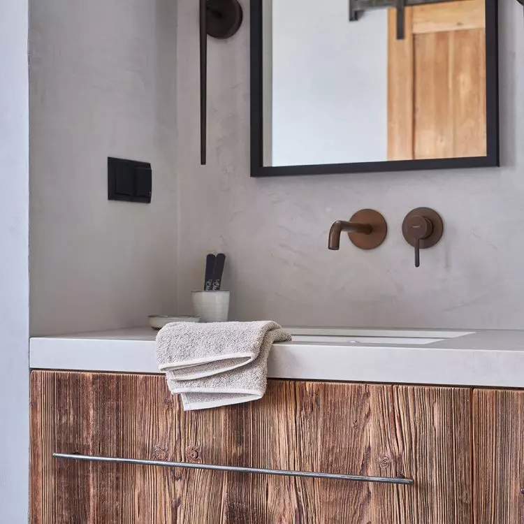 The chest of drawers was created from recycled wood